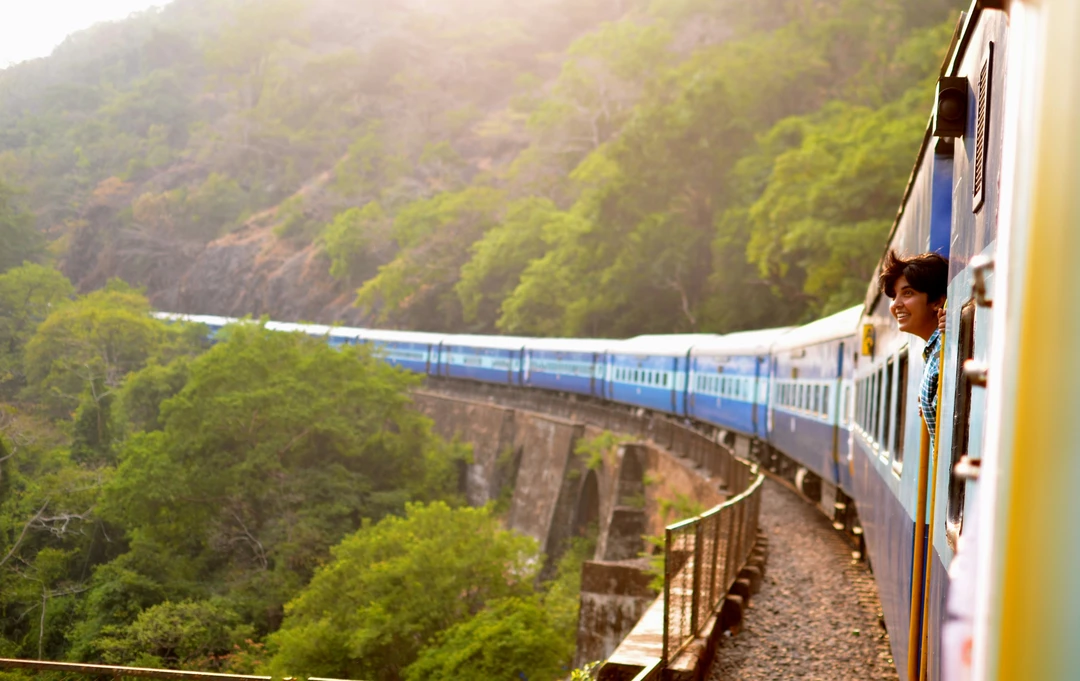 A Scenic Train Journey Through the Ghats to Goa Hot air balloons over African savannah at sunrise