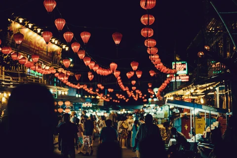 Vietnamese street with lanterns and historic buildings